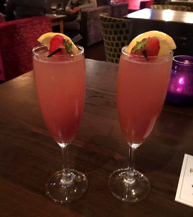 Two pink cocktails.
