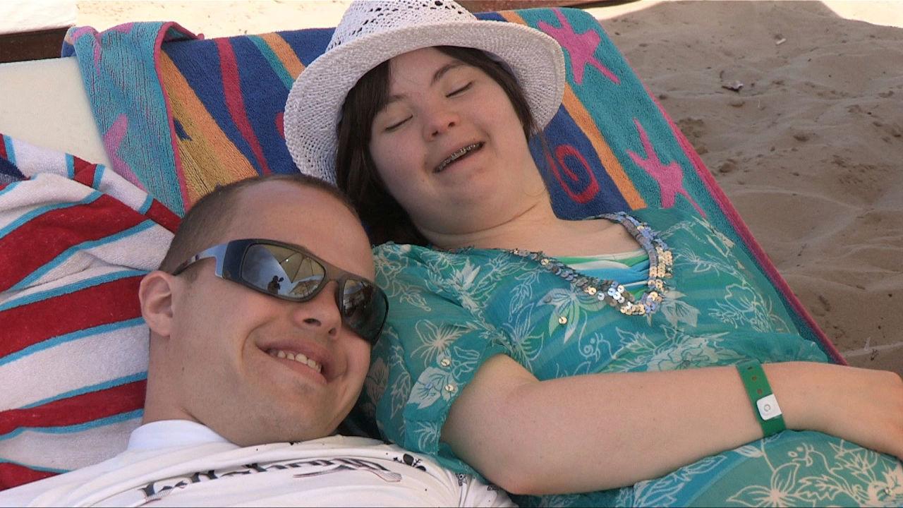 Sam & Megan on a sun lounger.